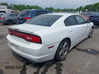 2013 Dodge Charger SE with VIN 2C3CDXFG7DH568461, listed as a IAAI auction lot 42025979 with 187,076 mi miles and . Bid and sale history available at carsss.com. Image 4.