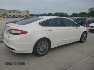 2013 Ford Fusion Titanium Hybrid с VIN 3FA6P0RU3DR282013, выставлен на аукционе Copart как лот 53651595 с пробегом 133 214 миль миль и Списание • Salvage title. История ставок и продаж доступна на DreamBid. Изображение 3.