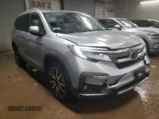 2021 Honda Pilot Elite with VIN 5FNYF6H04MB053008, listed as a Copart auction lot 87802955 with 70,737 mi miles and Salvage Title. Bid and sale history available at carsss.com. Image 4.