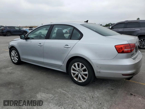 2015 Volkswagen Jetta SE with VIN 3VWD17AJ5FM285618, listed as a Copart auction lot 59930985 with 146,382 mi miles and Salvage title. Bid and sale history available at DreamBid. Image 2.