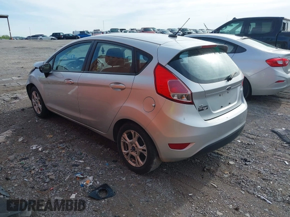 2014 Ford Fiesta SE with VIN 3FADP4EJ0EM215958, listed as a IAAI auction lot 42001168 with 115,231 mi miles and . Bid and sale history available at DreamBid. Image 3.