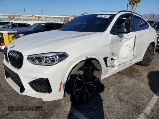2020 BMW X4 M Competition z VIN 5YMUJ0C01L9C90351, wystawiony jako Copart lot #79907904 z przebiegiem Nie podano mil oraz Szkody całkowita. Historia ofert i sprzedaży dostępna na DreamBid. Obrazek 1.