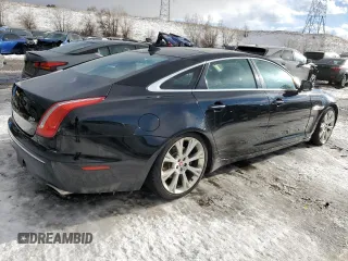 2015 Jaguar XJ Portfolio z VIN SAJWJ2GD4F8V79582, wystawiony jako Copart lot #42121395 z przebiegiem 65 017 mil mil oraz Szkoda całkowita • Salvage title. Historia ofert i sprzedaży dostępna na DreamBid. Obrazek 3.