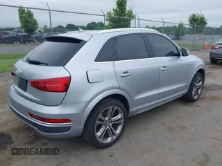 2016 Audi Q3 Prestige with VIN WA1FFCFS9GR007872, listed as a IAAI auction lot 42541509 with 86,187 mi miles and . Bid and sale history available at DreamBid. Image 4.