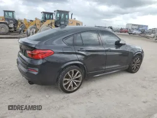 2017 BMW X4 M40i with VIN 5UXXW7C52H0M91419, listed as a Copart auction lot 79246144 with 87,641 mi miles and Clean Title. Bid and sale history available at carsss.com. Image 3.