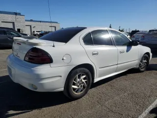 2004 Pontiac Grand Am SE1 with VIN 1G2NF52E84M575850, listed as a Copart auction lot 84547104 with 275,576 mi miles and Clean Title. Bid and sale history available at carsss.com. Image 3.