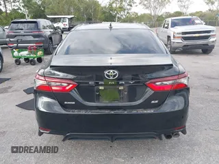 2021 Toyota Camry SE Nightshade with VIN 4T1G11AK2MU471174, listed as a IAAI auction lot 41740546 with 77,037 mi miles. Bid and sale history available at carsss.com. Image 16.