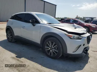 2017 Mazda CX-3 Touring z VIN JM1DKDC75H0168823, wystawiony jako Copart lot #57968955 z przebiegiem 116 231 mil mil oraz Szkoda całkowita • Salvage title. Historia ofert i sprzedaży dostępna na DreamBid. Obrazek 4.