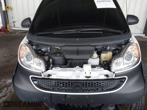 2014 Smart fortwo Pure z VIN WMEEJ3BA4EK737709, wystawiony jako IAAI lot #42105265 z przebiegiem 23 970 mil mil oraz . Historia ofert i sprzedaży dostępna na DreamBid. Obrazek 10.