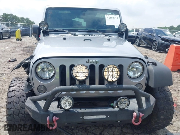 2016 Jeep Wrangler Black Bear with VIN 1C4AJWAG5GL258426, listed as a IAAI auction lot 42400914 with 128,606 mi miles and . Bid and sale history available at DreamBid. Image 12.