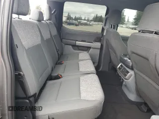 2023 Ford F-150 Lightning Pro with VIN 1FTVW1EL8PWG38419, listed as a Copart auction lot 47630535 with 11,940 mi miles and Salvage Title. Bid and sale history available at DreamBid. Image 10.