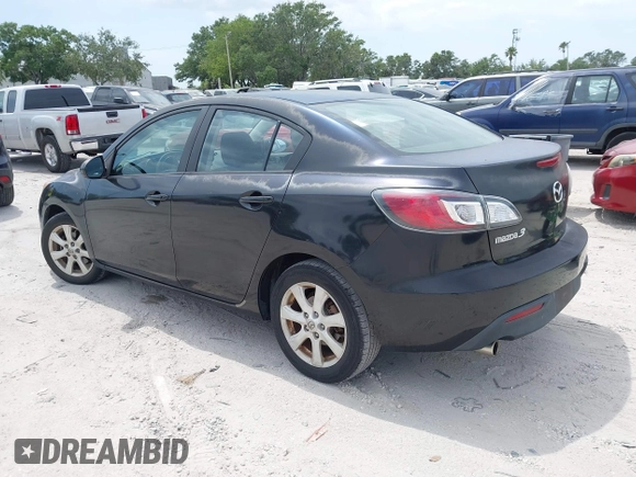 2011 Mazda Mazda3 i Touring with VIN JM1BL1VFXB1472772, listed as a IAAI auction lot 42180030 with 128,438 mi miles. Bid and sale history available at carsss.com. Image 3.