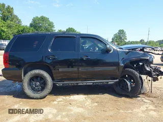 2013 Chevrolet Tahoe LS with VIN 1GNSCAE06DR263469, listed as a IAAI auction lot 42245636 with 240,506 mi miles and . Bid and sale history available at DreamBid. Image 14.