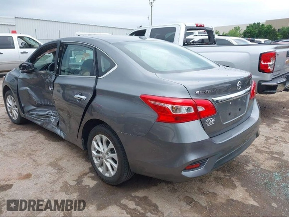 2019 Nissan Sentra S with VIN 3N1AB7AP9KY415350, listed as a IAAI auction lot 41059859 with 51,416 mi miles and . Bid and sale history available at DreamBid. Image 3.
