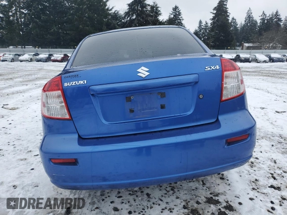 2012 Suzuki SX4 LE z VIN JS2YC5A30C6305375, wystawiony jako Copart lot #45429185 z przebiegiem 103 283 mil mil oraz Szkoda całkowita • Salvage title. Historia ofert i sprzedaży dostępna na DreamBid. Obrazek 6.