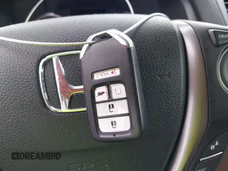 2016 Honda Pilot EX-L with VIN 5FNYF6H55GB082646, listed as a IAAI auction lot 42682375 with 96,314 mi miles and . Bid and sale history available at DreamBid. Image 11.