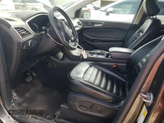 2020 Ford Edge SEL с VIN 2FMPK3J97LBB39094, выставлен на аукционе Copart как лот 58571215 с пробегом 95 329 миль миль и Списание • Salvage title. История ставок и продаж доступна на DreamBid. Изображение 7.