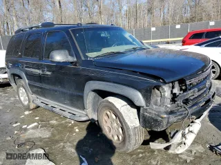 2005 Chevrolet Tahoe Z71 with VIN 1GNEK13T45R153826, listed as a Copart auction lot 87712455 with 244,533 mi miles and Salvage Title. Bid and sale history available at carsss.com. Image 4.