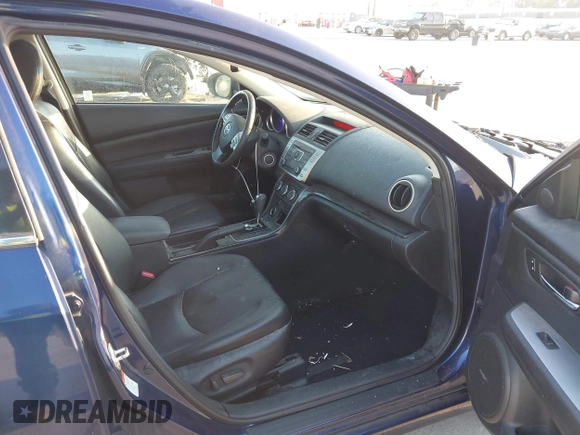 2009 Mazda 6 S Grand Touring with VIN 1YVHP82BX95M21357, listed as a IAAI auction lot 42013043 with 119,701 mi miles and . Bid and sale history available at DreamBid. Image 5.