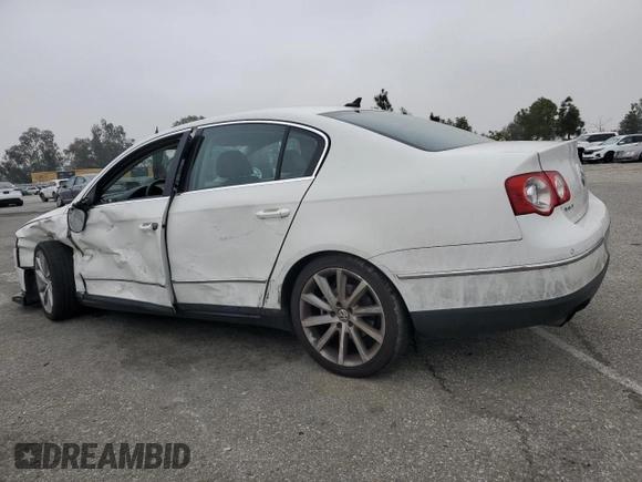 2008 Volkswagen Passat z VIN WVWCU73C58P028217, wystawiony jako Copart lot #52451275 z przebiegiem 70 829 mil mil oraz Szkoda całkowita • Salvage title. Historia ofert i sprzedaży dostępna na DreamBid. Obrazek 2.