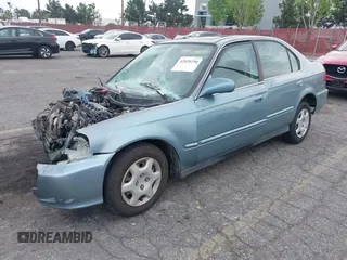 1999 Honda Civic EX z VIN 2HGEJ8643XH532751, wystawiony jako IAAI lot #42020290 z przebiegiem 239 316 mil mil oraz . Historia ofert i sprzedaży dostępna na DreamBid. Obrazek 2.
