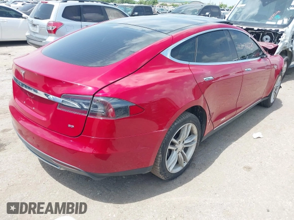 2014 Tesla Model S 60 with VIN 5YJSA1H14EFP63897, listed as a IAAI auction lot 42713272 with Not provided miles and . Bid and sale history available at DreamBid. Image 4.