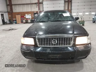 2008 Mercury Grand Marquis LS z VIN 2MEFM75V18X617284, wystawiony jako IAAI lot #41948364 z przebiegiem 106 294 mil mil oraz . Historia ofert i sprzedaży dostępna na DreamBid. Obrazek 6.