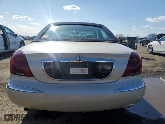 1999 Lincoln Continental with VIN 1LNHM97V1XY610090, listed as a Copart auction lot 50447685 with 105,375 mi miles and Clean title. Bid and sale history available at DreamBid. Image 6.