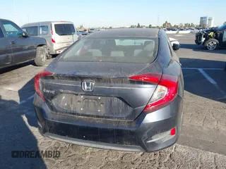 2017 Honda Civic Sedan LX with VIN 19XFC2F65HE209813, listed as a IAAI auction lot 41049476 with 61,482 mi miles. Bid and sale history available at carsss.com. Image 16.