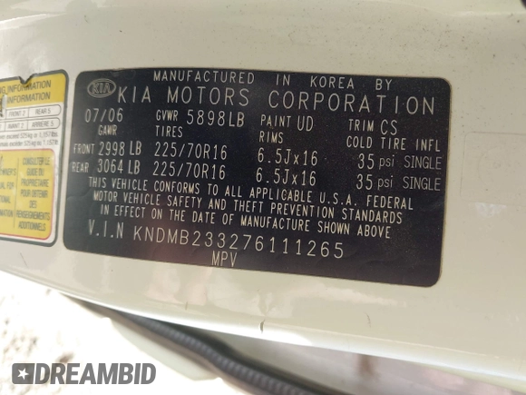 2007 Kia Sedona EX with VIN KNDMB233276111265, listed as a IAAI auction lot 41973188 with 197,754 mi miles. Bid and sale history available at carsss.com. Image 9.