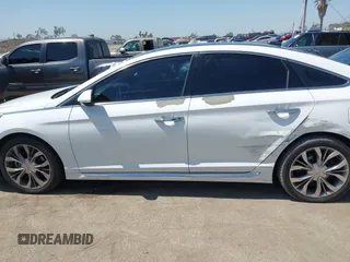 2015 Hyundai Sonata Sport with VIN 5NPE34ABXFH195251, listed as a IAAI auction lot 42002496 with 142,381 mi miles and . Bid and sale history available at carsss.com. Image 14.