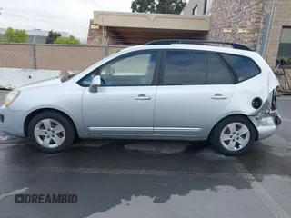 2009 Kia Rondo LX with VIN KNAFG528497222225, listed as a IAAI auction lot 42108192 with 113,040 mi miles. Bid and sale history available at carsss.com. Image 15.
