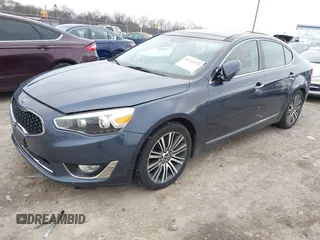 2014 Kia Cadenza Premium with VIN KNALN4D74E5125829, listed as a IAAI auction lot 41244172 with 167,617 mi miles. Bid and sale history available at carsss.com. Image 2.