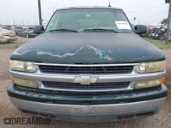 2002 Chevrolet Tahoe LT z VIN 1GNEC13ZX2R279380, wystawiony jako IAAI lot #42324646 z przebiegiem 188 781 mil mil oraz . Historia ofert i sprzedaży dostępna na DreamBid. Obrazek 6.
