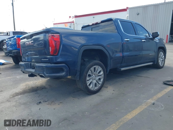 2020 GMC Sierra 1500 Denali with VIN 1GTU9FEL3LZ195864, listed as a IAAI auction lot 40593921 with 74,982 mi miles and . Bid and sale history available at DreamBid. Image 4.