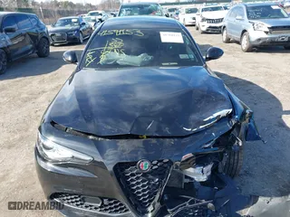 2021 Alfa Romeo Giulia Ti with VIN ZARFANBN1M7649953, listed as a IAAI auction lot 41591153 with 16,672 mi miles. Bid and sale history available at carsss.com. Image 12.