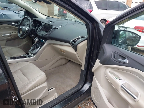 2013 Ford Escape SEL with VIN 1FMCU9H97DUA80867, listed as a IAAI auction lot 42709994 with Not provided miles and . Bid and sale history available at DreamBid. Image 5.