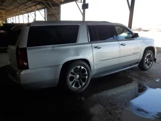 2018 Chevrolet Suburban Premier with VIN 1GNSCJKC7JR104888, listed as a Copart auction lot 68027604 with 69,632 mi miles and Salvage Title. Bid and sale history available at carsss.com. Image 3.