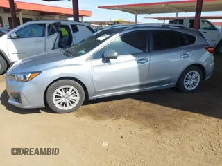 2017 Subaru Impreza Premium z VIN 4S3GTAB69H3703779, wystawiony jako IAAI lot #42151284 z przebiegiem 135 455 mil mil oraz . Historia ofert i sprzedaży dostępna na DreamBid. Obrazek 17.