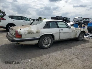 1989 Jaguar XJS z VIN SAJNY584XKC161154, wystawiony jako Copart lot #70912984 z przebiegiem 65 188 mil mil oraz Czysty tytuł • Clean title. Historia ofert i sprzedaży dostępna na DreamBid. Obrazek 3.