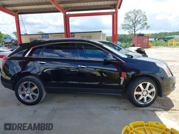2012 Cadillac SRX Premium Collection z VIN 3GYFNCE36CS615725, wystawiony jako IAAI lot #42738584 z przebiegiem 156 625 mil mil oraz . Historia ofert i sprzedaży dostępna na DreamBid. Obrazek 13.
