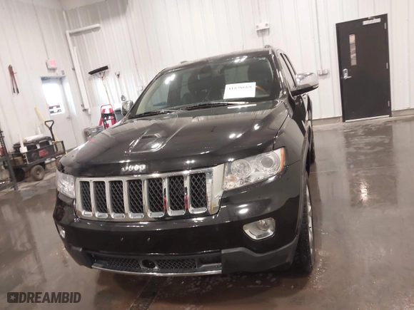 2011 Jeep Grand Cherokee Overland with VIN 1J4RR6GT7BC607735, listed as a IAAI auction lot 41830669 with 98,161 mi miles. Bid and sale history available at carsss.com. Image 13.