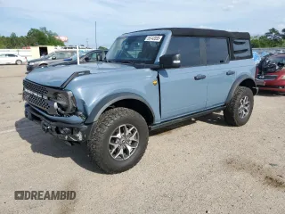 2023 Ford Bronco с VIN 1FMEE5DPXPLA82044, выставлен на аукционе Copart как лот 55742035 с пробегом 50 397 миль миль и Списание • Salvage title. История ставок и продаж доступна на DreamBid. Изображение 1.