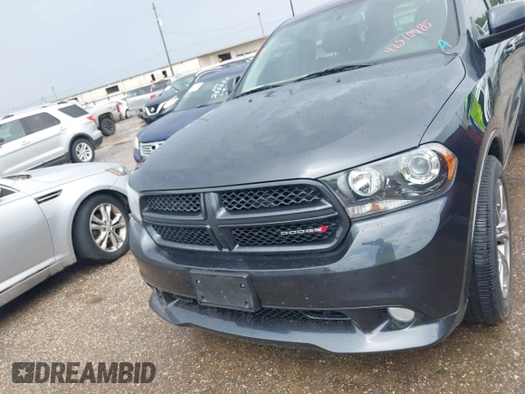 2013 Dodge Durango R/T with VIN 1C4SDHCT6DC658802, listed as a IAAI auction lot 42510985 with 67,653 mi miles and . Bid and sale history available at DreamBid. Image 6.