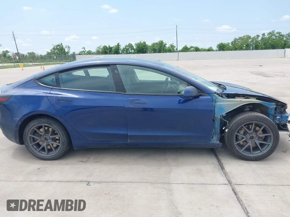 2022 Tesla Model 3 Long Range z VIN 5YJ3E1EB2NF246443, wystawiony jako IAAI lot #42179219 z przebiegiem Nie podano mil oraz . Historia ofert i sprzedaży dostępna na DreamBid. Obrazek 13.