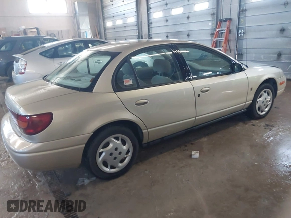 2002 Saturn SL with VIN 1G8ZK52792Z143191, listed as a IAAI auction lot 41831087 with 85,301 mi miles and . Bid and sale history available at DreamBid. Image 4.