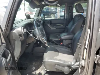 2016 Jeep Wrangler Unlimited Freedom с VIN 1C4BJWDG4GL153134, выставлен на аукционе Copart как лот 57954635 с пробегом 105 250 миль миль и Списание • Salvage title. История ставок и продаж доступна на DreamBid. Изображение 7.