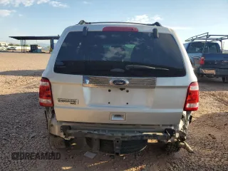2011 Ford Escape Limited with VIN 1FMCU9EG2BKA74440, listed as a Copart auction lot 61081835 with 136,933 mi miles and Salvage title. Bid and sale history available at DreamBid. Image 6.