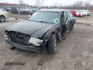 2006 Chrysler 300 C with VIN 2C3KA63H06H189591, listed as a IAAI auction lot 41810691 with 184,465 mi miles. Bid and sale history available at carsss.com. Image 2.