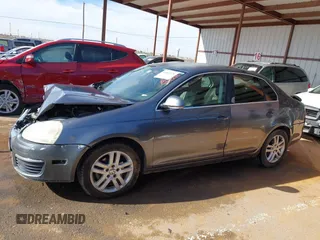 2007 Volkswagen Jetta 2.5 z VIN 3VWRF71K37M101410, wystawiony jako IAAI lot #41863276 z przebiegiem 195 616 mil mil oraz . Historia ofert i sprzedaży dostępna na DreamBid. Obrazek 14.